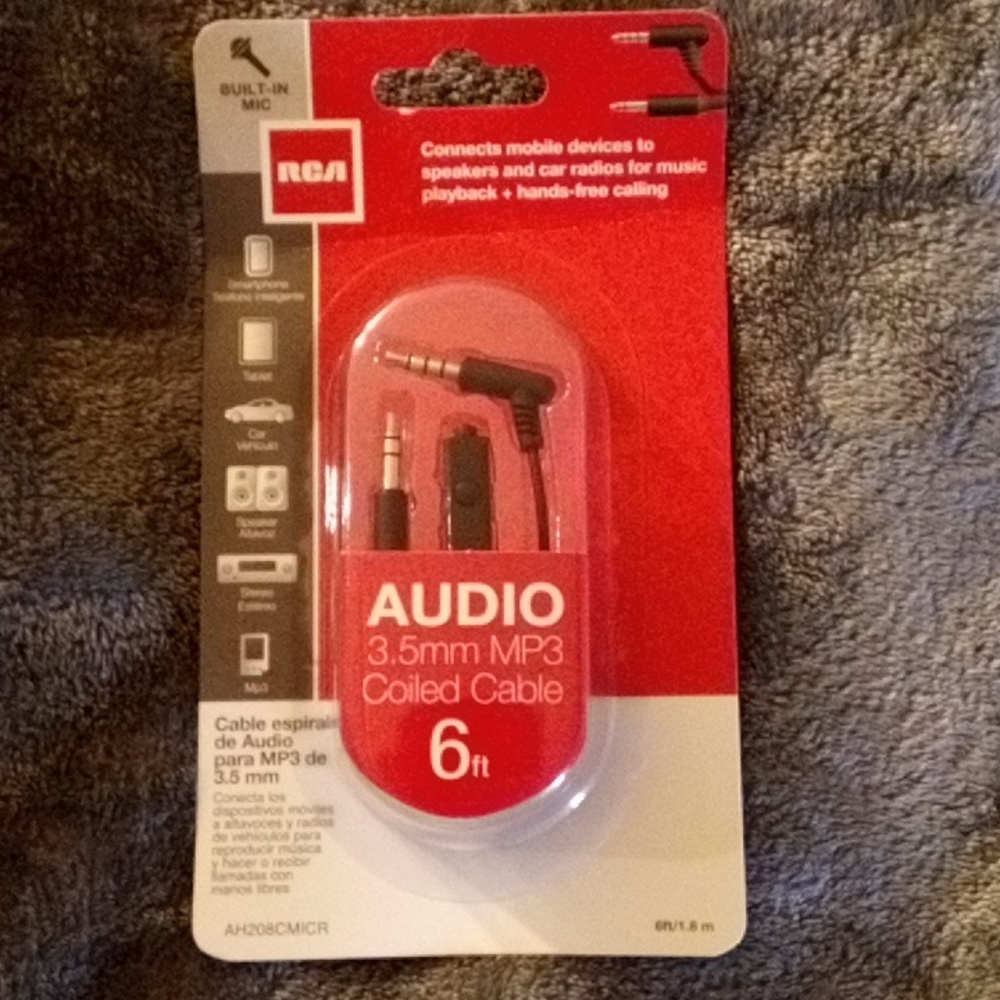 BRAND NEW IN PACK RCA COILED AUX CABLE W/ MICRO